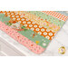 A super close up on the mat demonstrating fabric prints and color details.