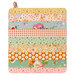 The completed Dry Ideas project, colored in bright 30s style fabrics from the Cotton Nook collection by Riley Blake Designs, isolated on a white background. 