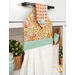 A shot of the top section of the towel taken from a slight angle, showing details on the bell fabric as well as the fabric button.