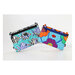 Two Foldilocks zippered wallets featuring colorful quilted prints, including zebra and bright floral designs.