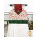 A close up on the top section of the towel, showing details on the bell fabric as well as the fabric button.