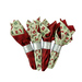 The four completed cloth napkins, colored in red, cream, and mint green fabrics from the Evergreen Wishes collection by Riley Blake Designs, isolated on a white background. 