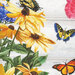 an 8x8 swatch of the panel featuring butterflies and yellow flowers on a grey wood textured background.