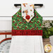 A head-on close up on the top section of the towel, showing details on the fabric as well as the fabric button.