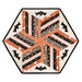 The completed 60 Degree Diamond Table Topper, colored in Halloween fabrics from the Purrs & Boos collection by Moda Fabrics, isolated on a white background. 