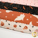 A super close up on the mat demonstrating fabric prints and color details.