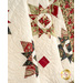 A close up on the draped quilt, demonstrating flow and form of the project.