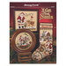 Front cover of the cross stitch pattern with the finished projects staged on a red festive background.