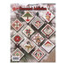 Back cover of the pattern booklet showing the finished ornaments displayed over a Christmas tree background.