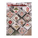 Front cover of the pattern booklet showing the finished ornaments displayed over a Christmas tree background.