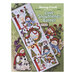 Front cover of the cross stitch pattern with the finished banner staged on a green background.