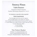 Back of Snowy Pines table runner pattern, listing fabric requirements and contact details.