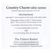 Back of Country Charm table runner pattern, listing fabric requirements and contact details.