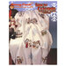 Front of the Snow Friends Collectors series afghan cross stitch pattern showing the finished design framed with coordinated décor.