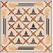 Halloween Quilt with repeated stars, witches hats, and brooms, in orange, black, and beige.