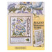 Front cover of the cross stitch pattern with the finished project shown in an enlarged version and a version on a magnet board.