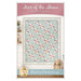 Front cover of the "Star of the Show" baby quilt with pastel star pattern in blue, pink, and cream.