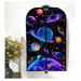 The completed project colored in a vibrant space themed panel, staged on a hanger against a white shiplap wall with coordinating flowers.