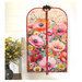 The front of the completed project colored in a vibrant poppy themed panel, staged on a hanger against a white shiplap wall with coordinating flowers.