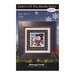 Front of the Pattern of the Month Series Give cross stitch pattern with the finished design in a black wooden frame isolated on a wintry scene.