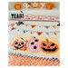Close up on the appliqué block featuring a row of cute jack spooky jack-o'-lanterns.
