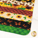 A super close up on the mat demonstrating fabric prints and color details.