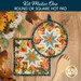 The completed Folded Hot Star Pads colored in warm autumnal fabrics from the Baskets of Autumn Blessings from Studio E Fabrics, staged on a wooden table with coordinating décor.