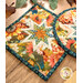 A close up of the edge of the round hot pad, showing the binding as well as the fabric loop.