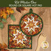 The completed Folded Hot Star Pads colored in warm autumnal fabrics from the Baskets of Autumn Blessings from Studio E Fabrics, staged on a wooden table with coordinating décor.
