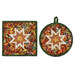 The completed Folded Hot Star Pads colored in warm autumnal fabrics from the Baskets of Autumn Blessings from Studio E Fabrics, isolated on a white background.