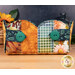 A head on shot of the side of the basket, showing fabric and button details.