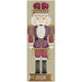 Finished cross stitch pattern of a nutcracker with a royal crown and purple clothing.