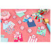 Crafting workspace with colorful fabric squares, alphabet clips, and assorted buttons.