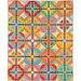 Colorful quilt pattern with repeated circular geometric blocks in a grid.