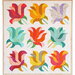Colorful quilt with nine stylized flower blocks arranged in a 3x3 grid.