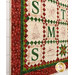 An angled shot of the quilt, showing details on the borders as well as the hourglass sashing.