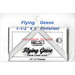 The 1.5" x 3" Flying Geese Square Up Ruler in its packaging and isolated on a white background. 