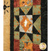 A super close up on a sawtooth star from the patchwork border, demonstrating fabric print and color details as well as top quilting effects.