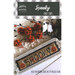 Front of the patern showing finished project staged in a white frame with halloween elements. 