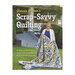 Front cover of the Scrap-Savvy Quilting book with a woman in front of a modern home holding a colorful quilt.
