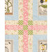 A close up on the sashing of the quilt, demonstrating fabric colors and print details.