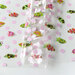 Tula Pink School Crossing TPU vinyl featuring schools of colorful fish in an underwater-inspired design.