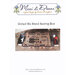 Front cover of the United We Stand Sewing Box cross stitch pattern with the finished pattern with the box laid out on the floor and opened up to show pinkeeps.