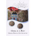 Cover of “Spring in a Box” by Ezia Gladstone, showing floral embroidery on a gift box design.