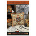 The front of the pattern showing the finished project staged amongst coordinating Halloween decor.
