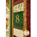 An angled shot of the Day 8 dimensional pocket, showing details on the appliqué number and fabric details.