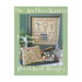 Front cover of The Walker Sisters cross stitch pattern book with two finished patterns in a household scene.