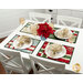 The completed Fat Quarter Shuffle Mats, staged on a white table with four coordinating table settings with plates, napkins, glasses, and a blue jar of poinsettias in the center.