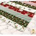 A super close up on the mat demonstrating fabric prints and color details.