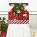 A head-on close up on the top section of the towel, showing details on the fabric as well as the fabric button.